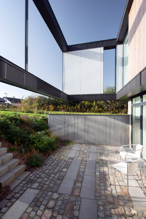 CF Møller's Villa R features a sunken floor for the clients' children