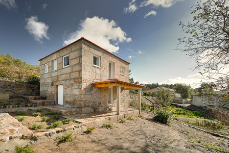 Wood Structure Inside Stone Walls by Corpo Atelier