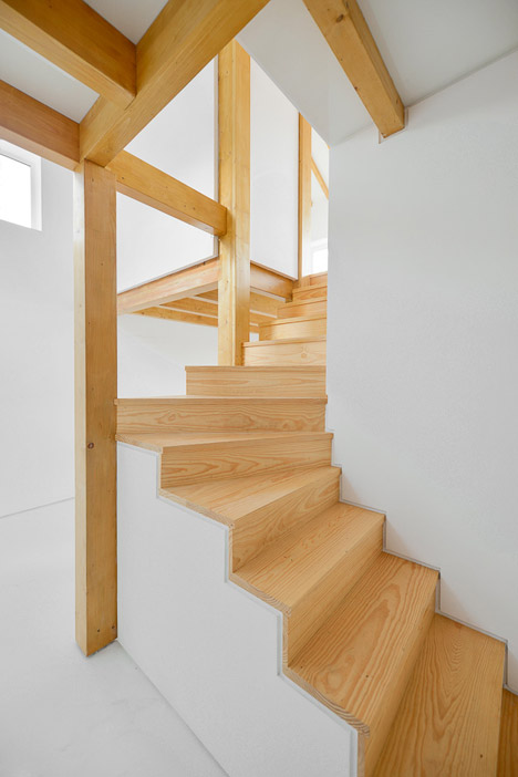Wood Structure Inside Stone Walls by Corpo Atelier