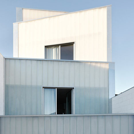 Rue Space’s Casa #20 features a four-tiered facade of translucent glass