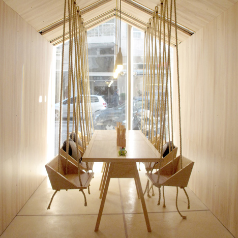 Fiii Fun House cafe by Íris Cantante features wooden swing seats