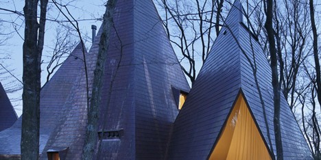 Woodland home by Hiroshi Nakamura designed to resemble a cluster of timber tepees
