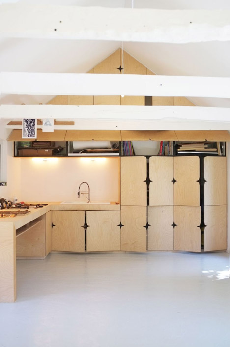 An old barn converted into an artist studio in Brittany by Modal Architecture