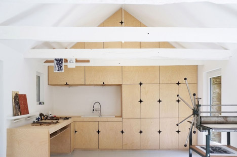 An old barn converted into an artist studio in Brittany by Modal Architecture