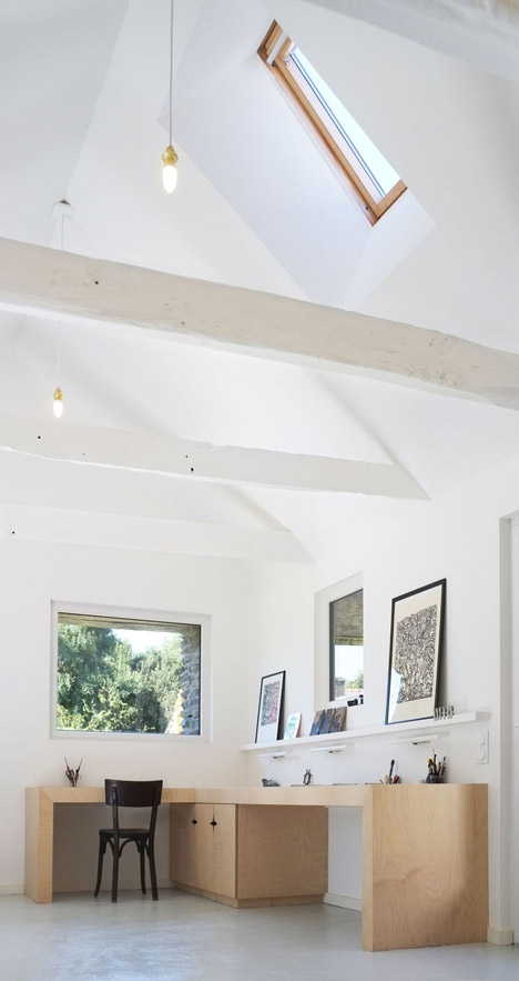 An old barn converted into an artist studio in Brittany by Modal Architecture