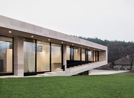 Slight slope long house by I-O Architects