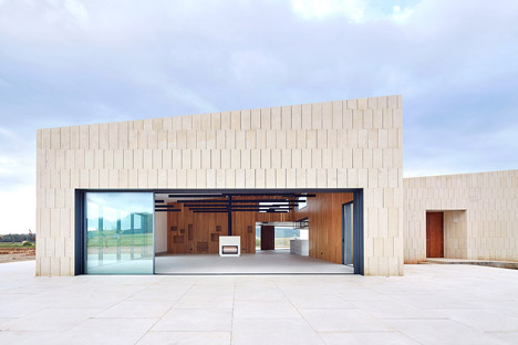 Stone Clubhouse by GRAS Arquitectos