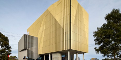 Woods Bagot adds elevated golden tower to Melbourne’s Deakin University