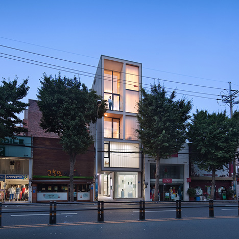 JMY Architects combines living and retail spaces on a narrow site in Busan