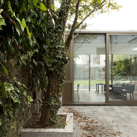 Glazed house extension by GKMP Architects “feels like part of the garden”
