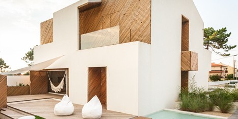 Ernesto Pereira updates a coastal Portuguese home with timber-clad cutaways