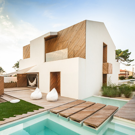 Ernesto Pereira updates a coastal Portuguese home with timber-clad cutaways