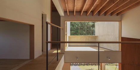 House in Japan designed by Kazuki Moroe to respect the shrine next door