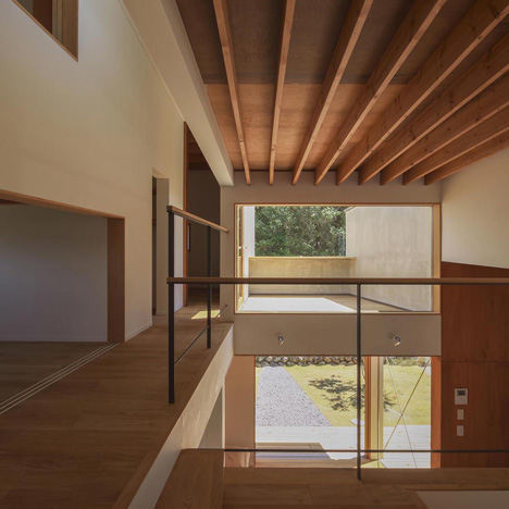 House in Japan designed by Kazuki Moroe to respect the shrine next door