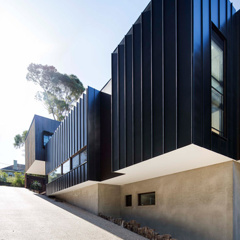 Mt Martha Beach House by Wolveridge Architects is clad in a mixture of weather-resilient materials
