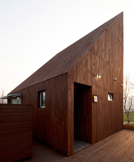 Slow Island Trip Center by OUJAE Architects