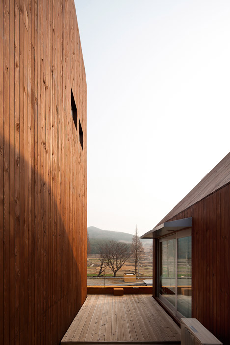 Slow Island Trip Center by OUJAE Architects