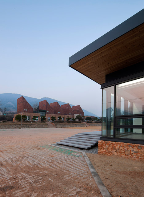 Slow Island Trip Center by OUJAE Architects