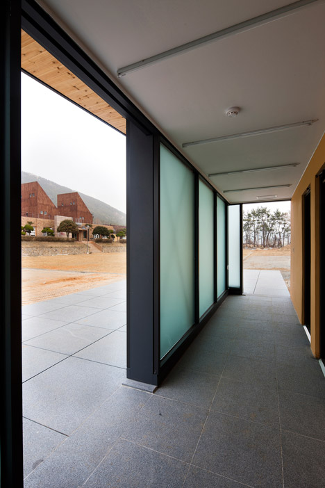 Slow Island Trip Center by OUJAE Architects