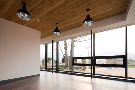 Slow Island Trip Center by OUJAE Architects