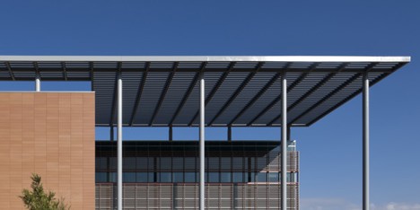 Texan military hospital by RTKL features slatted sun shades based on skin grafts