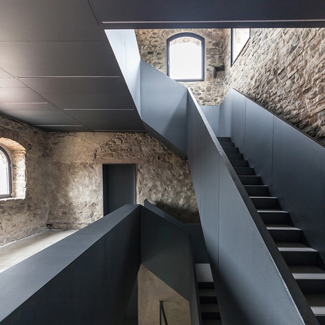 Gianluca Gelmini inserts an angular iron staircase inside a medieval Italian fortress