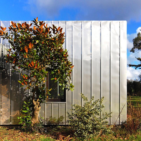 Edgley Design wraps a dilapidated 1960s house in stainless steel roofing