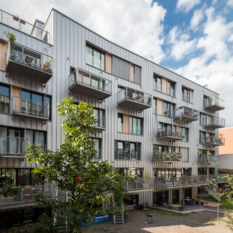 Brutopia is an aluminium-clad apartment complex built by a cooperative in Brussels