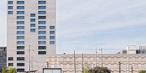 Zurich building by E2A incorporates the facade of a century-old warehouse