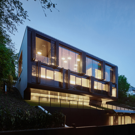 Perforated shutters move mechanically to mask the facade of Archinauten’s House GT