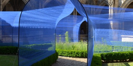 Atelier Yokyok installs vaulted string tunnels in a Gothic cloister garden