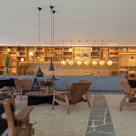 Studio MK27 surrounds Rio lighting showroom with wooden lattice