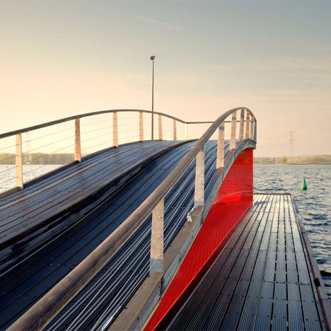 René van Zuuk creates a wavy pier with an integrated lightbox over an Almere lake