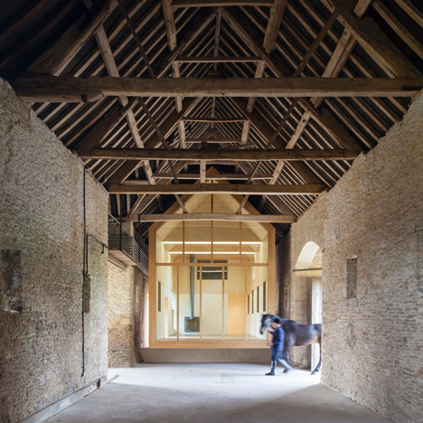 Private art gallery by Stonewood Design cantilevers into a 17th-century Cotswolds barn