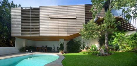 Suspended garage by Hiboux Architecture