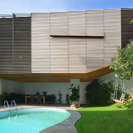 Suspended garage by Hiboux Architecture
