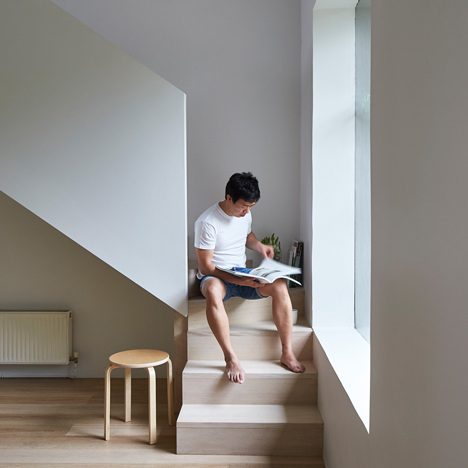 Wilson Tang adds oak staircases and marble surfaces for Theresa St Residence renovation