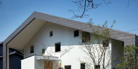 House in Wakayama by Spray shelters four triangular terraces beneath its wonky roof