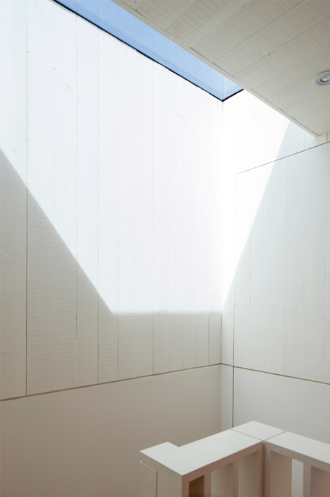 West Heath loft conversion with a secret room by Milford Martin Architects