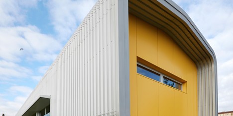 Tube-shaped school canteen built from prefabricated modules in just three months