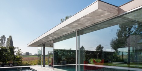 Lieven Dejaeghere’s pool house is a glass box topped with a concrete roof