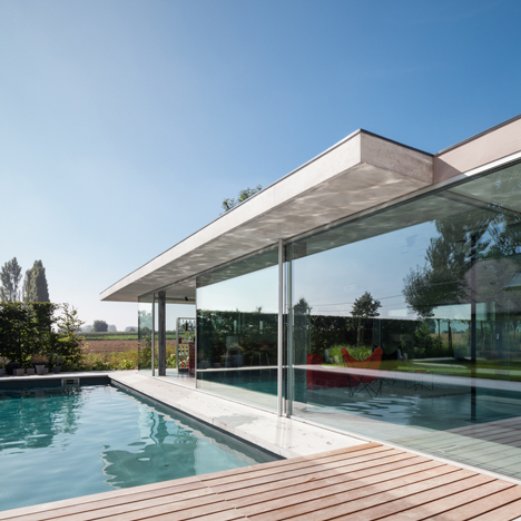 Lieven Dejaeghere’s pool house is a glass box topped with a concrete roof