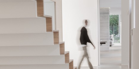 Contekst combines oak, stone and concrete inside a minimal Belgian house architecture Dezeen