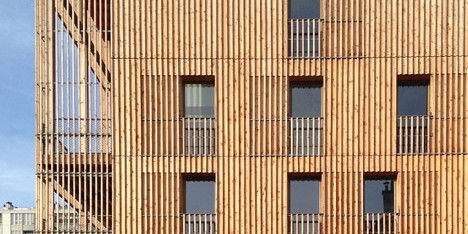 Paris housing blocks by Tectône Architectes are encased by timber louvres