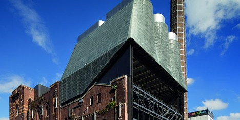 Metal-clad power plant by Tzannes Associates is mounted on the roof of an old Sydney brewery