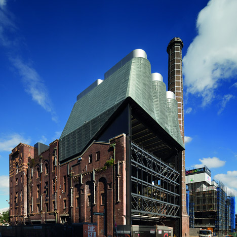 Metal-clad power plant by Tzannes Associates is mounted on the roof of an old Sydney brewery