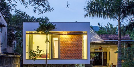 Nha4 Architects adds flood-proof extension to family home in Vietnam