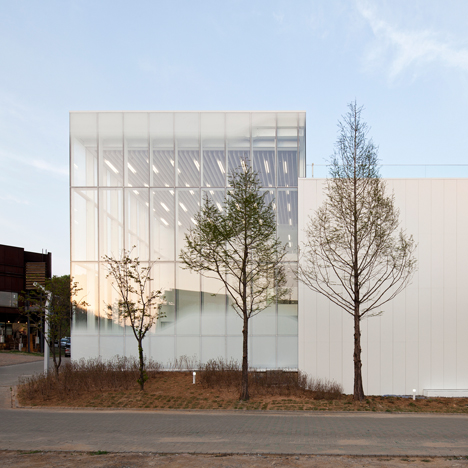 White Block Gallery by SsD features fritted glass designed to evoke morning fog