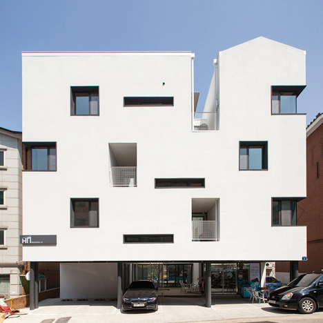 Seoul apartment block by Archihood WXY features tunnel-like balconies and gabled corners