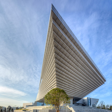 Qujing History Museum in China features a roof shaped like an upside-down staircase
